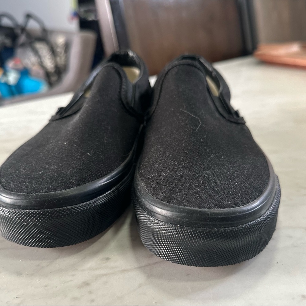 Vans slip on sneakers